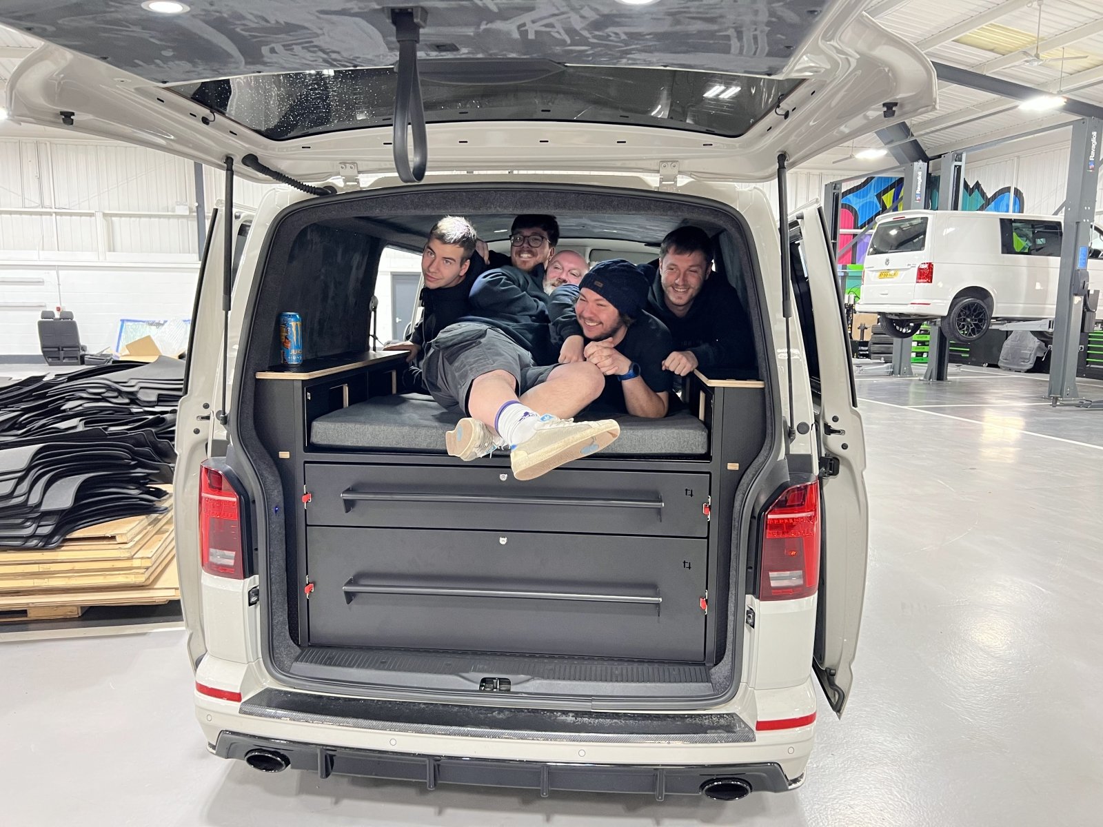 5 people on a steelpod bed at Leighton Vans